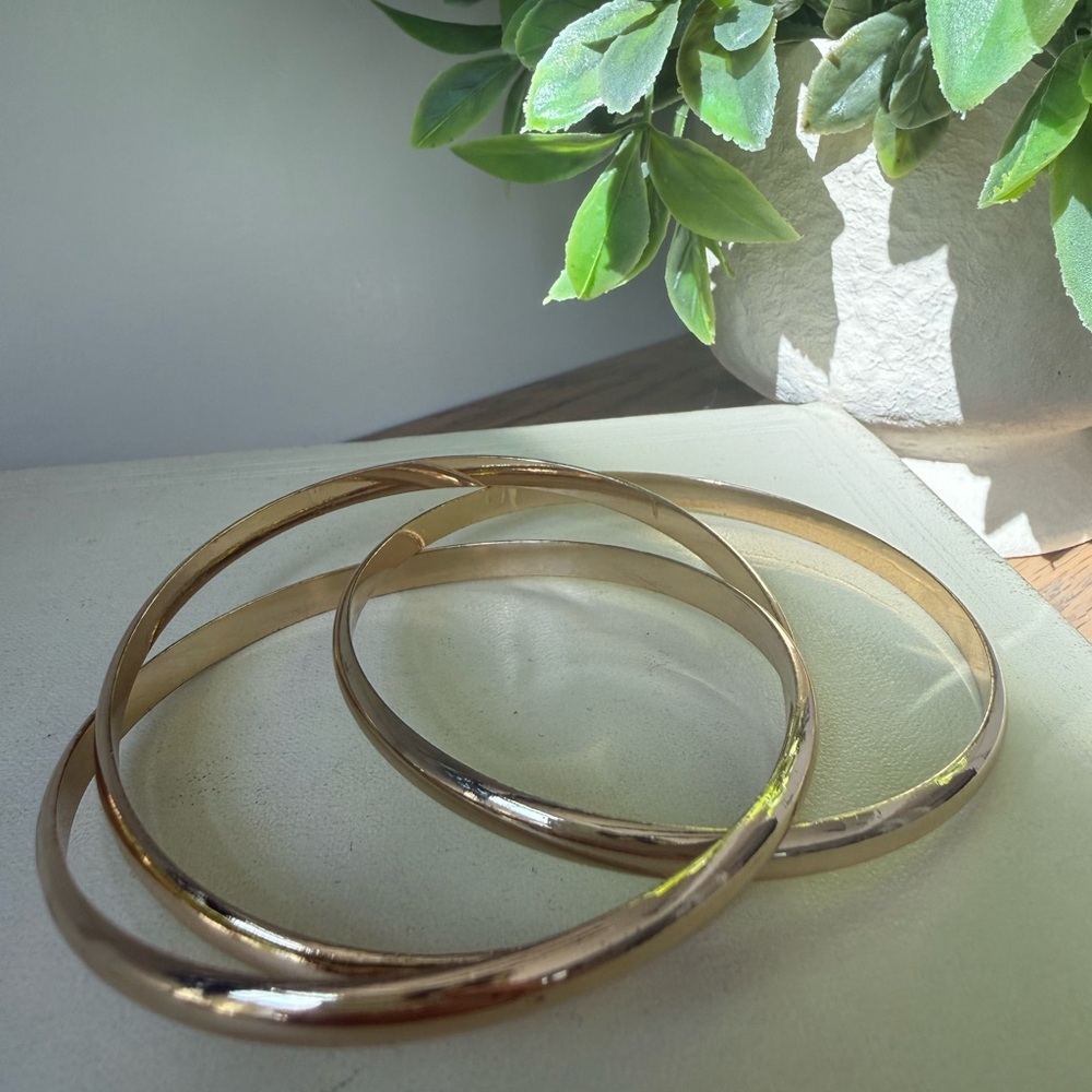 Gold tone bangles